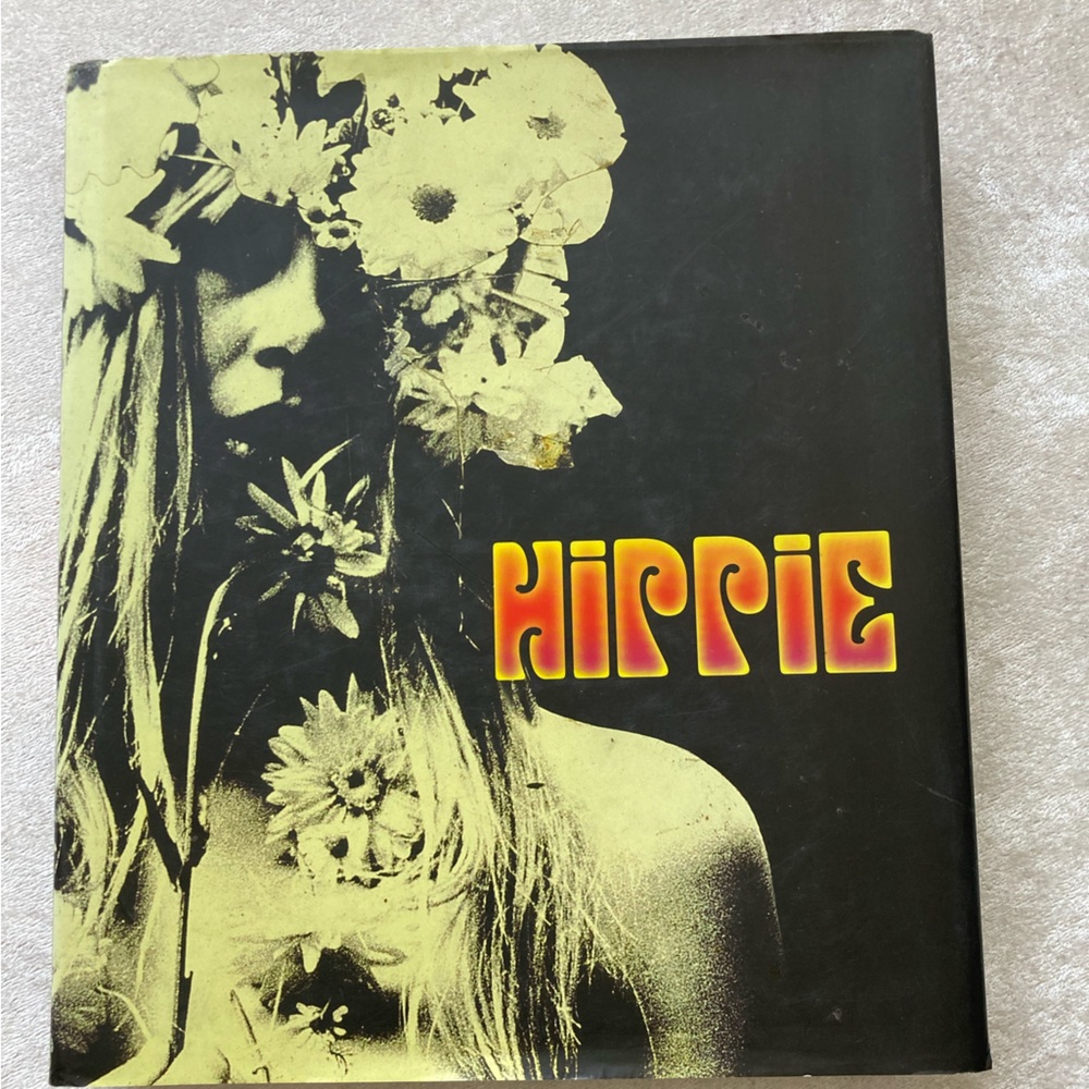 Hippie large black and cream colored coffee table book